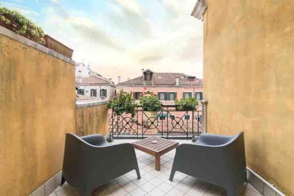 Ca’ Pesaro rooftop terrace apartment.